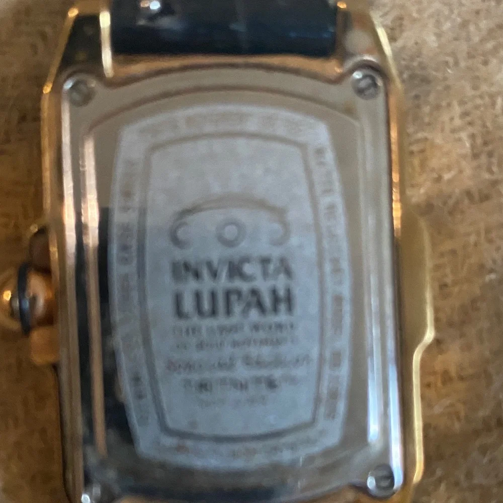 Invicta Lupah LadiesGold Tone Watch with Black Strap and White Dial